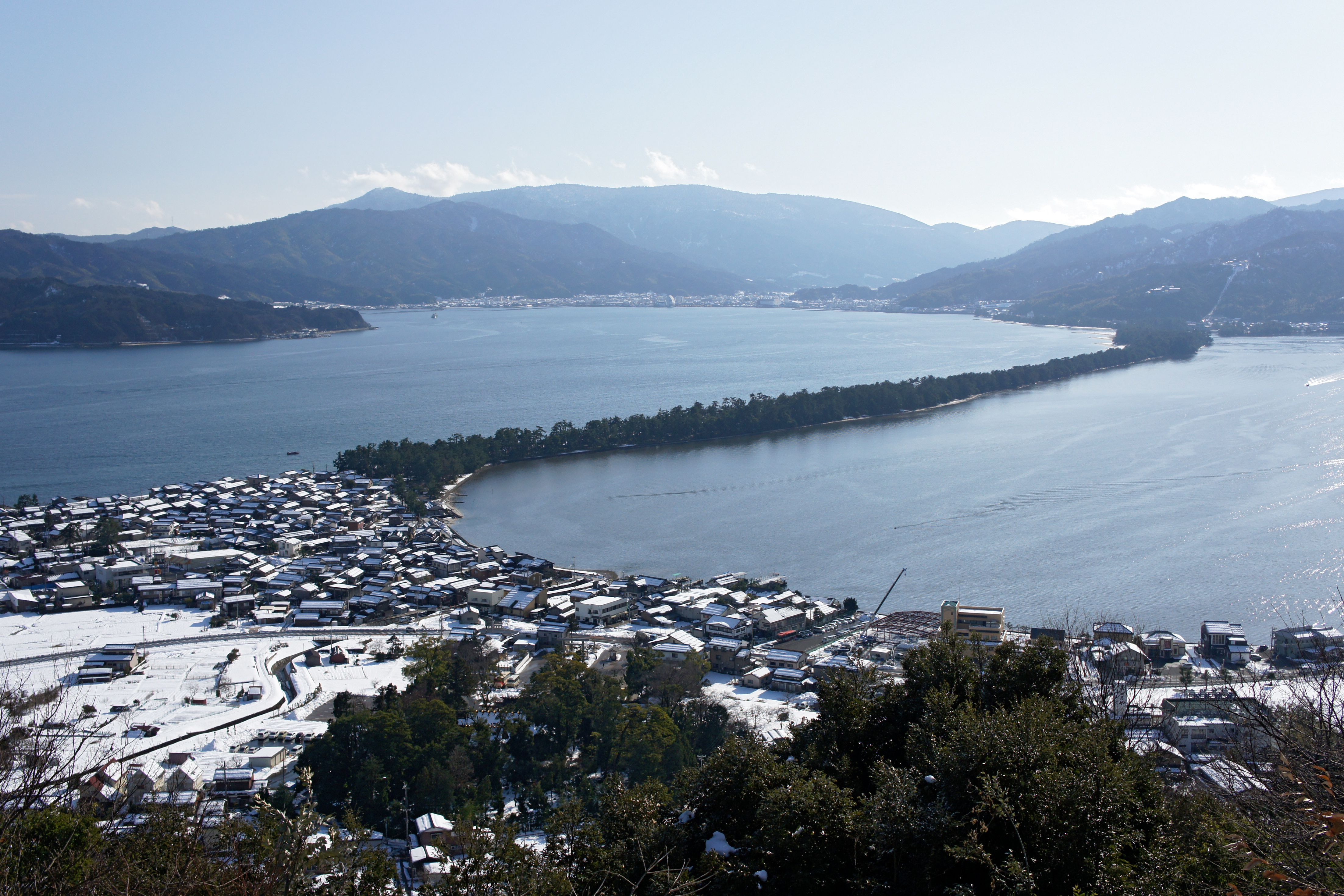 The Amanohashidate pine sandbar curving across Miyazu Bay, seen from Kasamatsu Park