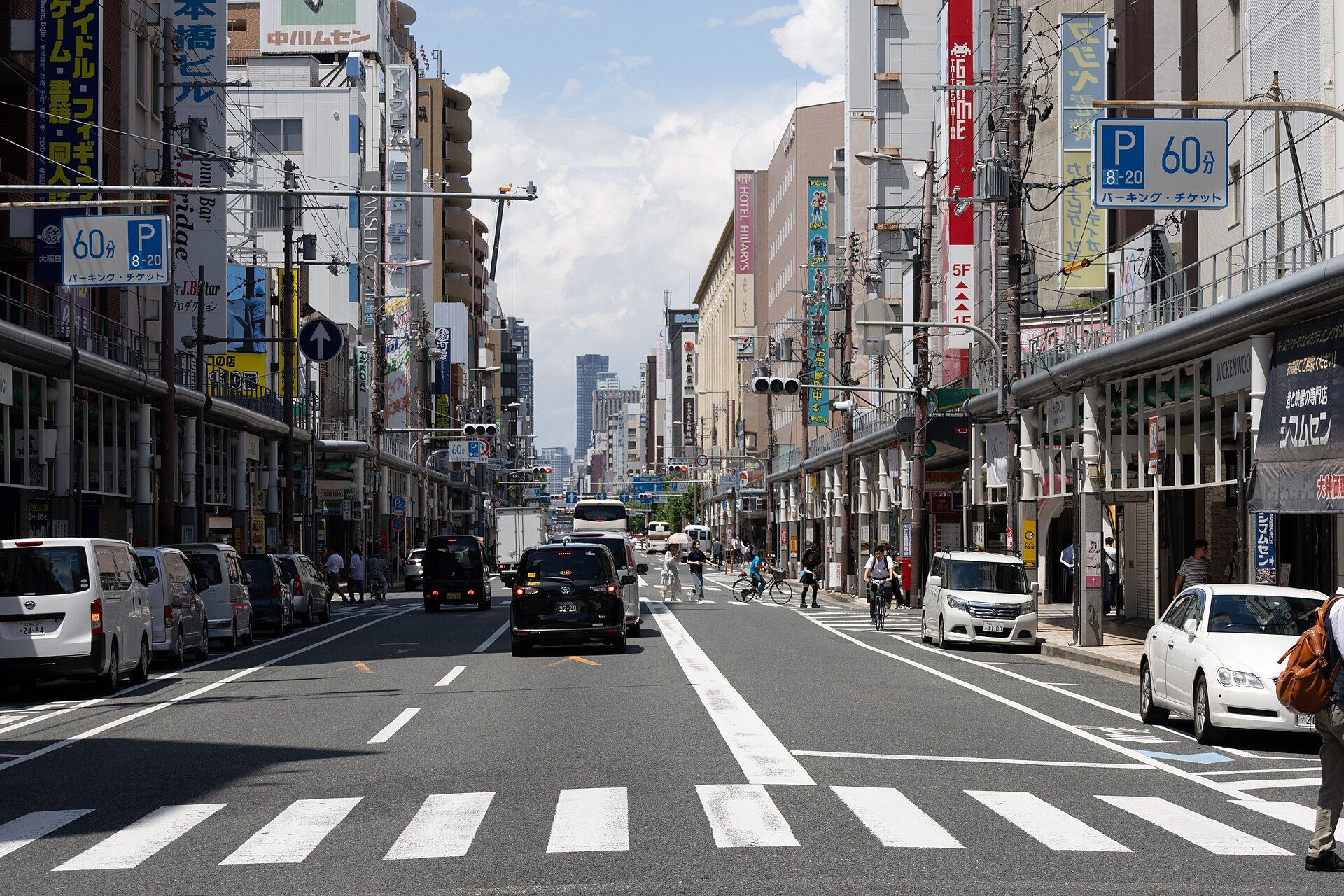 The main street of Den Den Town, Nipponbashi, lined with electronics and hobby shop signs
