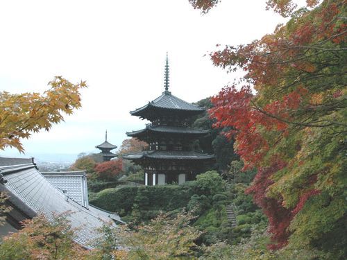 The east (Nara-period) and west (early Heian-period) pagodas of Taima-dera framed by autumn maples, Nara