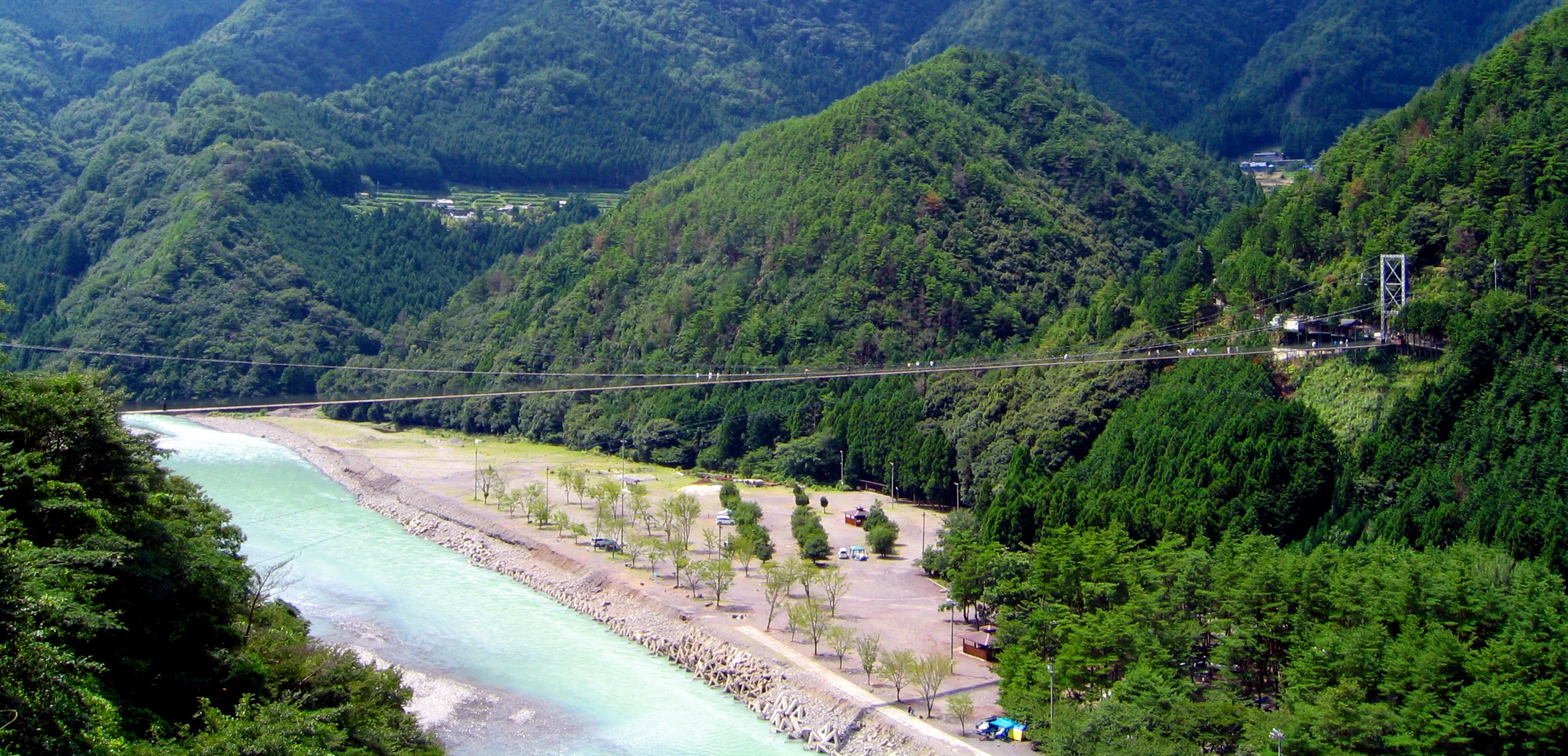 The Tanise suspension bridge spanning the Totsukawa river valley in Nara Prefecture